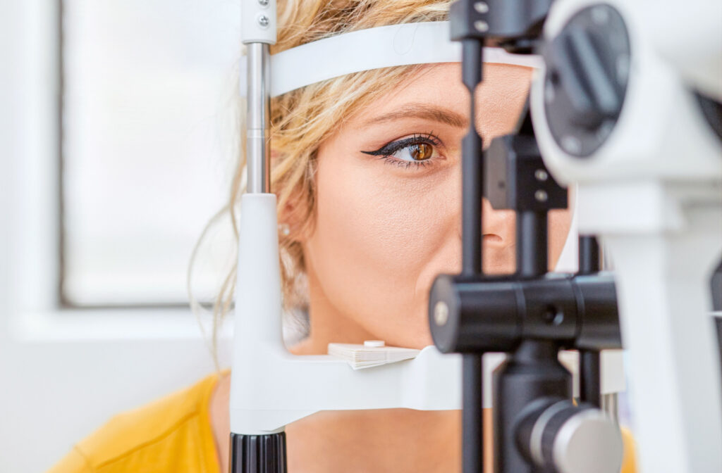 Close-up of a woman undergoing a slit-lamp exam.